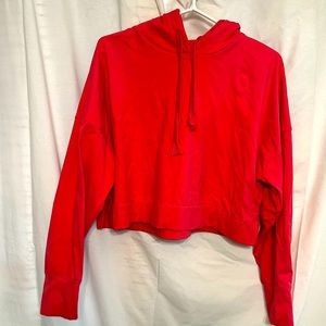 An athletic activewear hooded fashion sweatshirt can be worn in various settings